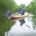 Male and Female Canoeing on still water